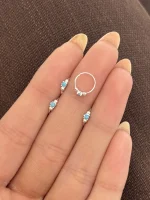 پیرسینگ بینی نگین فیروزه ای